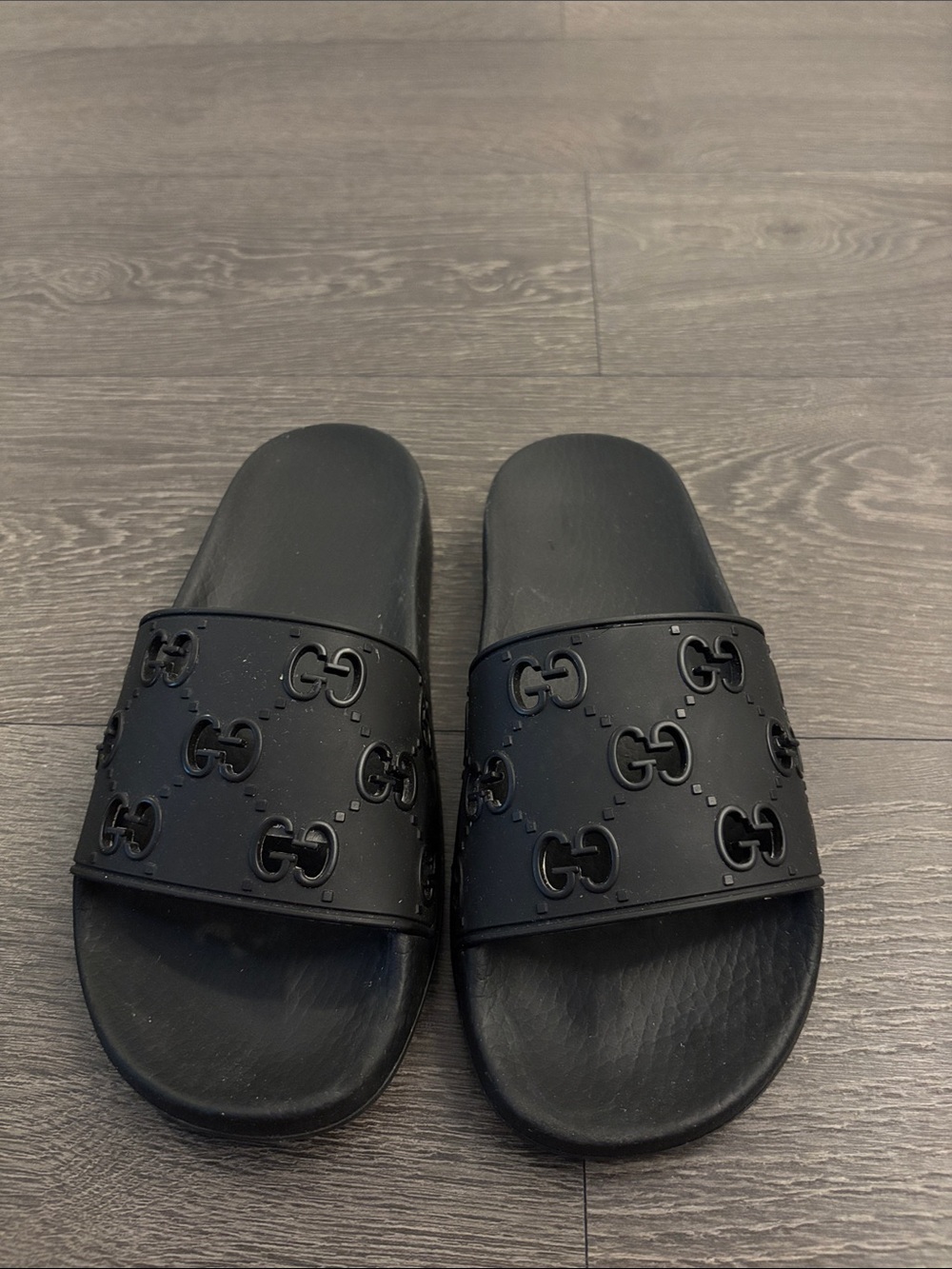 Black Gucci GG Embossed Slide Sandals